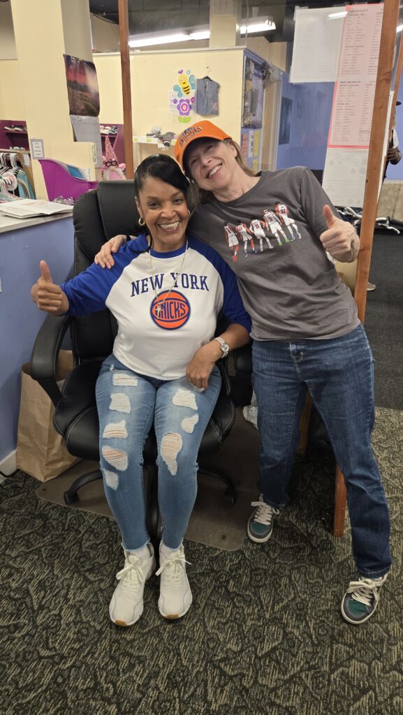 Susan (right) has volunteered at WAIM for about a decade! When she is not basking in the glory of a historic NY Knicks comeback victory with Nilda (left), Susan can be found checking in WAIM customers at our intake desks. The intake team is the first point of contact between shoppers and the organization. They are vital for ensuring that everyone feels welcome here.



Volunteering allows us to contribute to the common good of our community and to our own development, as well. If you'd like to get involved, contact Kristin Fortier at 860-456-7270 x109 or kristinfortier@waimct.org.